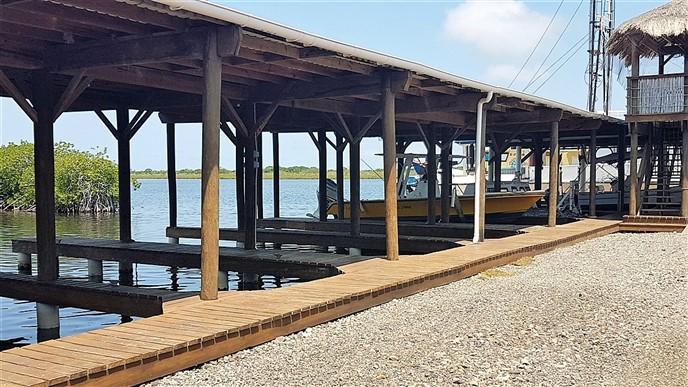 Listing ID: URE0367, Blue Bayou Utila, Bay Islands, HN - Boat Slip and Garage at the Palms, Photo #