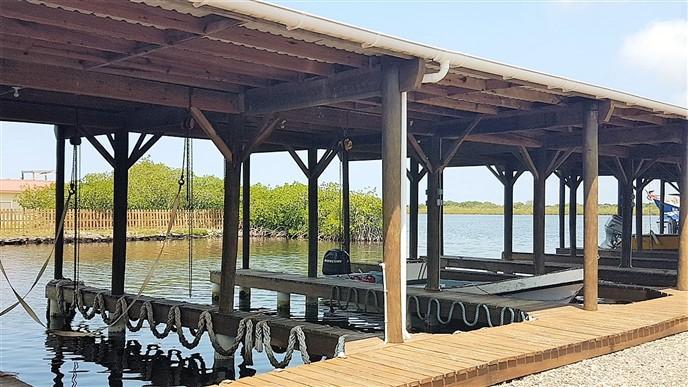 Listing ID: URE0367, Blue Bayou Utila, Bay Islands, HN - Boat Slip and Garage at the Palms, Photo #