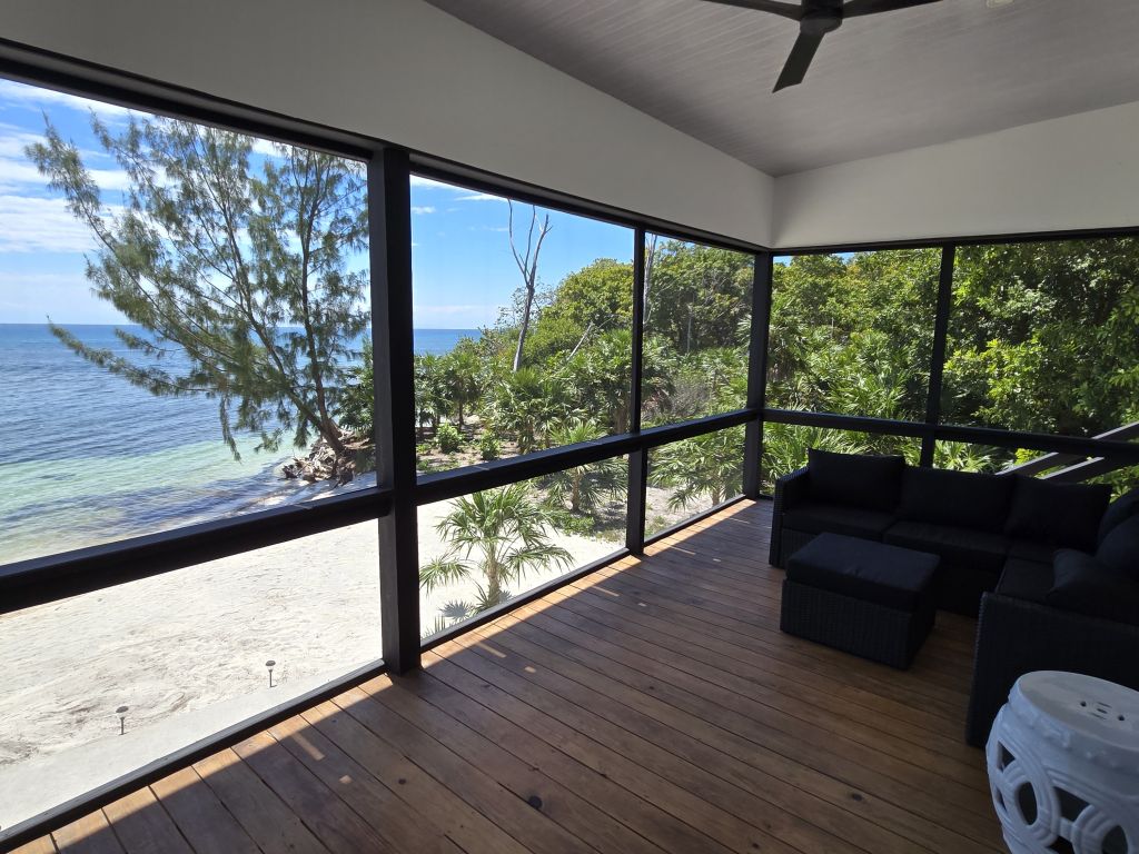 Listing ID: URE0474, Pine Point Utila, Bay Islands, HN - Sandy Shore Beach Home, Photo #