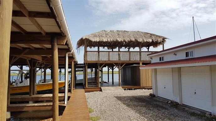 Listing ID: URE0689, The Palms, Blue Bayou Utila, Bay Islands, HN - Boat Slip With Garage At The Palms, Photo #