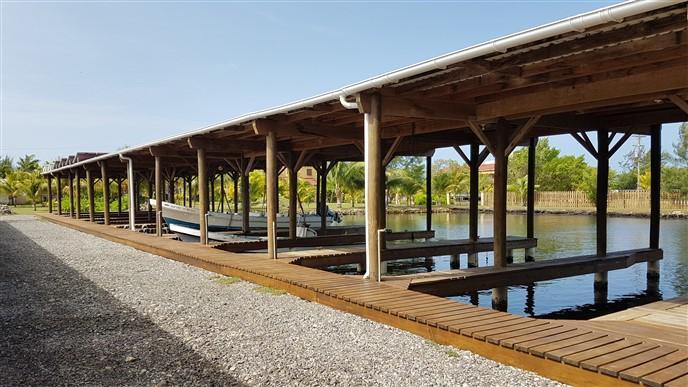 Listing ID: URE0689, The Palms, Blue Bayou Utila, Bay Islands, HN - Boat Slip With Garage At The Palms, Photo #