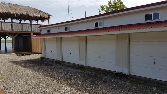 Listing ID: URE0689, The Palms, Blue Bayou Utila, Bay Islands, HN - Boat Slip With Garage At The Palms, Photo #